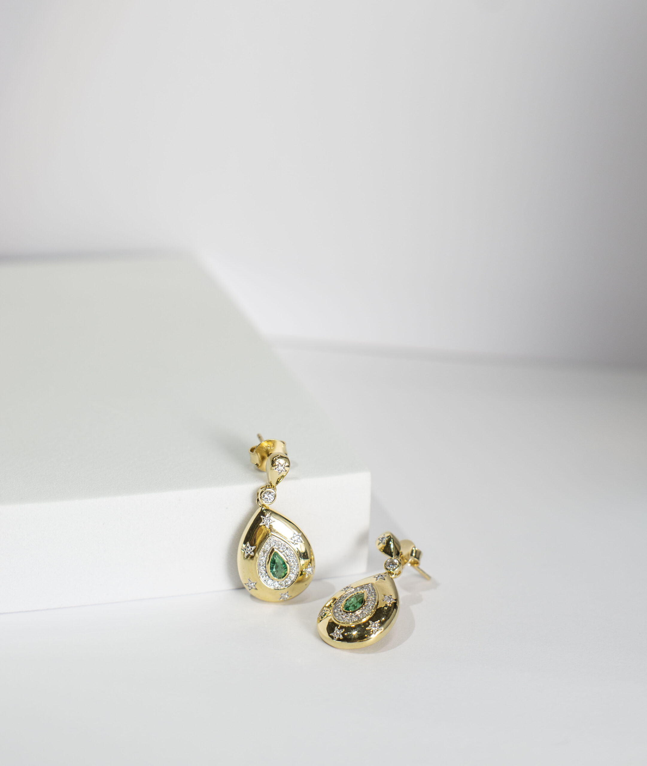 Star-Accented Emerald and Diamond Pear Drop Earrings in Yellow Gold